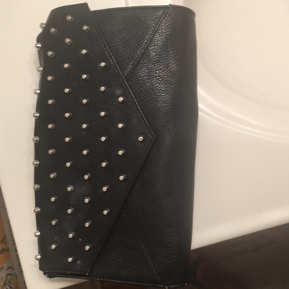 Black studded clutch